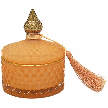 this Desire Noir Candle features a stylish ridged decal and tassel finish 