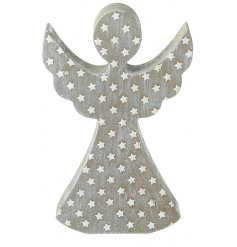 A whitewashed wooden angel decoration with added stars 