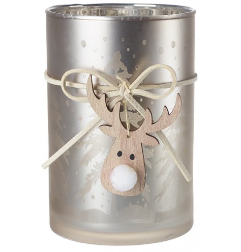 A decorative frosted glass candle holder set with a champagne gold print decal and hanging reindeer charm 