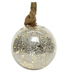 Hung from a chunky rope hanger, this large mottled glass bauble is filled with warm glowing LED string lights