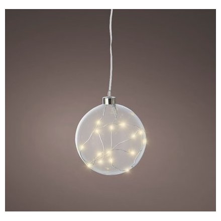 A contemporary and chic glass bauble filled with warm glow micro lights.
