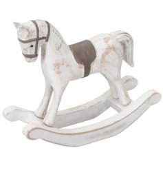 A decorative wooden rocking horse covered with a Rustic White Washed tone 