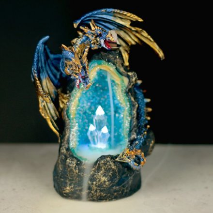 A deep blue crystal cave enchanted with mist from the backflow incense burner and guarded by a mystical dragon.