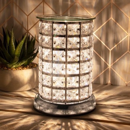  this Glitz themed Aroma Lamp will be sure to place perfectly in any home with its added Warm White LED centre