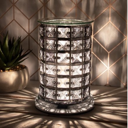 this Glitz themed Aroma Lamp will be sure to place perfectly in any home with its added Crisp White LED centre