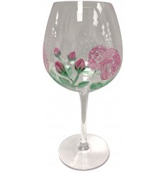 A gorgeously decorated hand painted Wine Glass with a delicate Pink Rose design 
