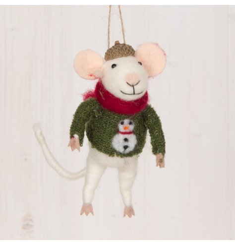 A festive little woollen mouse dressed up in a knitted jumper, scarf and acorn hat 