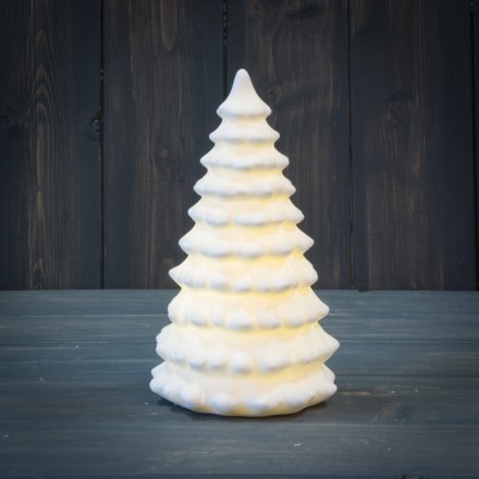 A white ceramic Tree Ornament with an added warm glowing LED centre 