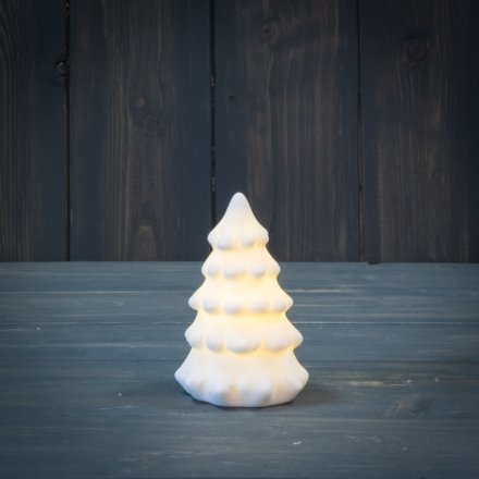  A white ceramic Tree Ornament with an added warm glowing LED centre 