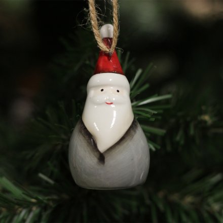  A small ceramic Santa hanging ornament in a soft grey and red tone 