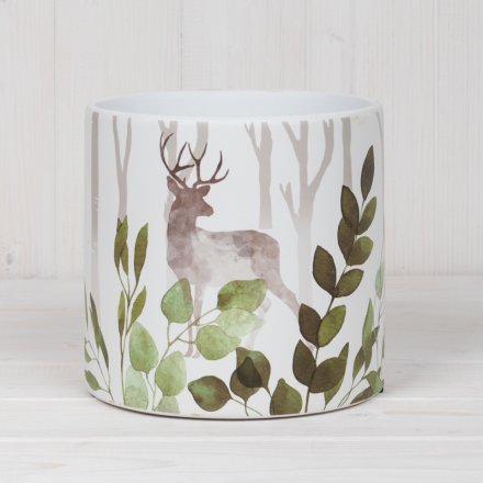 A chic woodland inspired planter with a stag design, trees and leaves. Created in a watercolour design.