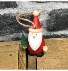  Simple and sweet for any Traditional themed home at Christmas, a small wooden hanging Santa decoration 