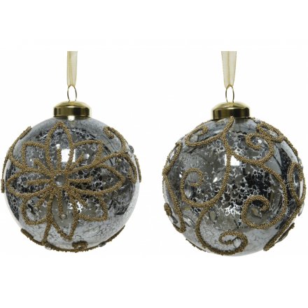 An Antique inspired assortment of speckled glass baubles each decorated with a luxe golden bead design 