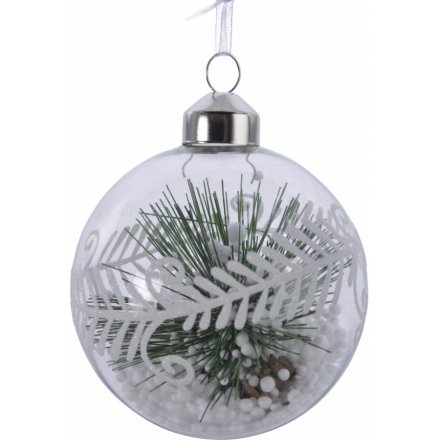 A beautiful set of 3 clear glass baubles filled with pine branch and fake snow 