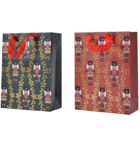 Traditional nutcrackers printed on two assorted gift bags in festive red and green.