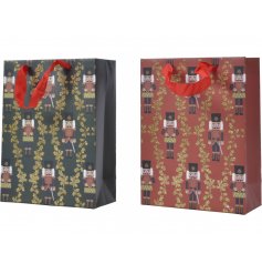   A charming assortment of gift bags, decorated with a traditional Nutcracker design and glittery finish 