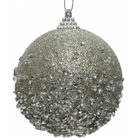 a foam bauble covered with silver glitter and diamontes 