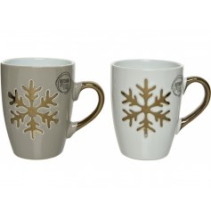 An assortment of sleek glazed Stoneware Mugs, set with golden handles and snowflake decals 