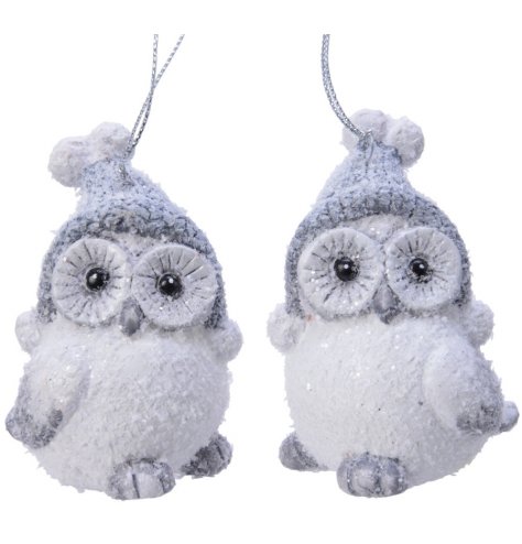 Two wide eyed snowy owls to hang in your winter wonderland themed tree.