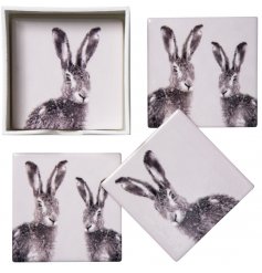 A set of 4 square ceramic coasters, each decorated with a cute Hare print