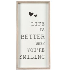 A tall standing printed quote with a natural wooden frame