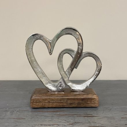  A decorative double heart link ornament, perfect for placing in any home 