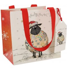 A fun and quirky designed gift bag decorated with an adorable festive woollen sheep print 