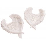 A beautifully simple angel wing shaped trinket dish in a soft white tone 