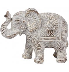 A beautifully decorated ornamental Elephant figure with an added brushed white tone and distressed charm 