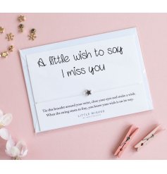Say it with a wish bracelet. A lovely bracelet with star charm set on a slogan card 