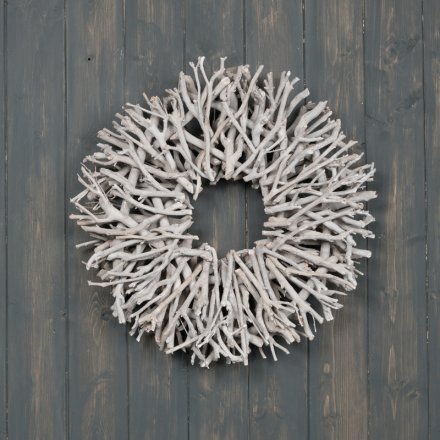 A stunning natural twig wreath with a grey washed finish. An on trend statement for the home or garden.