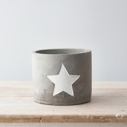 Stay on trend with this rough luxe cement planter, complete with a painted white star detail.