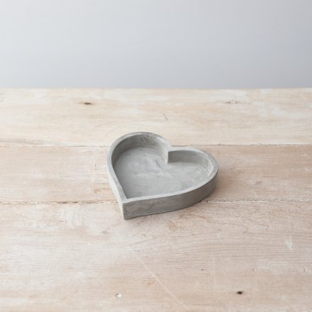 Stay on trend with this effortlessly cool rough luxe heart tray made from cement.