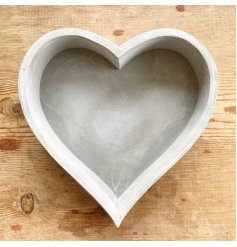 A rough luxe cement heart tray with plenty of character and charm. On trend and super chic.