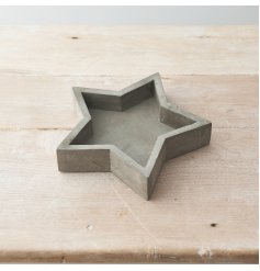 An effortlessly chic cement star tray with a raw and rustic finish.