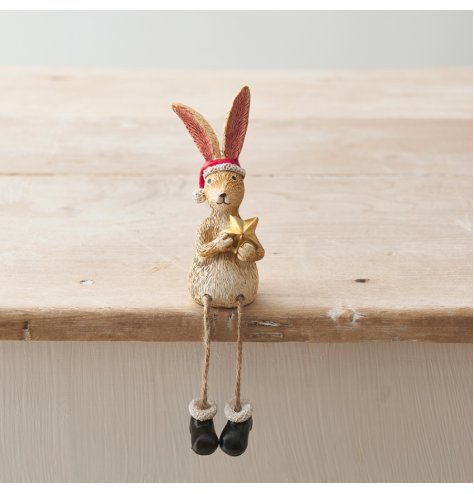 A beautifully detailed Santa rabbit shelf sitter. Complete with hat, boots and gold star.