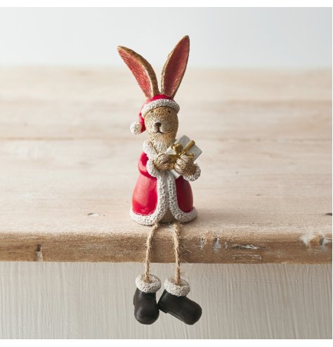 A beautifully detailed and super cute shelf sitting rabbit decoration. Complete with Santa outfit and gift.