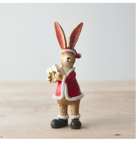 A unique, cute and wonderfully detailed standing rabbit decoration. Complete with Santa outfit and gift.
