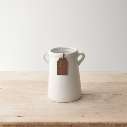 A rustic living ceramic vase with small eared handles. Complete with a stamped 'for you' PU leather tag. 