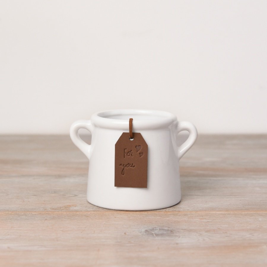 A classic white ceramic pot with small eared handles. Complete with a stylish PU leather tag in tan. 