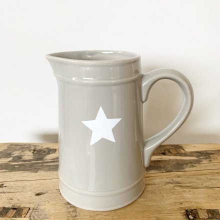 A classic grey jug with a stylish white star decal. 