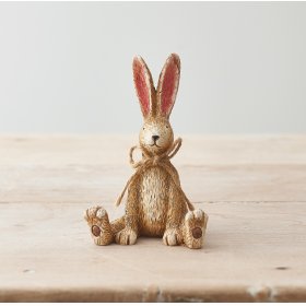 A charming and perfectly formed sitting rabbit decoration. Complete with pointed ears and a jute string bow. 
