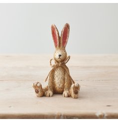 A charming and perfectly formed sitting rabbit decoration. Complete with pointed ears and a jute string bow. 