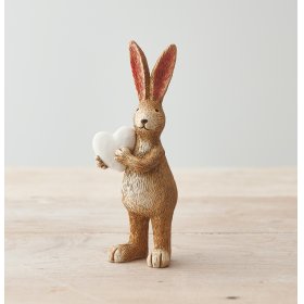 A charming standing rabbit ornament with tall pointed ears and a white heart.