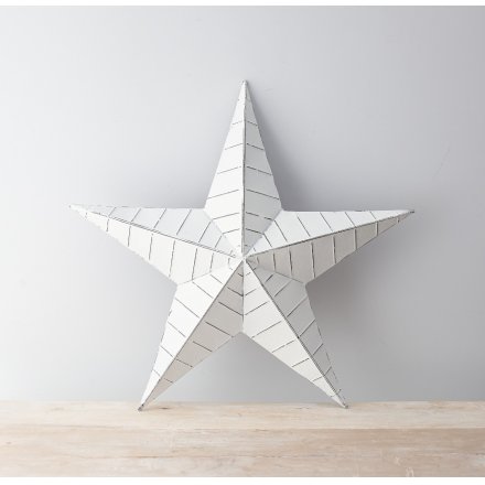 A unique metal barn star in white. Complete with a distressed finish and black ridges.