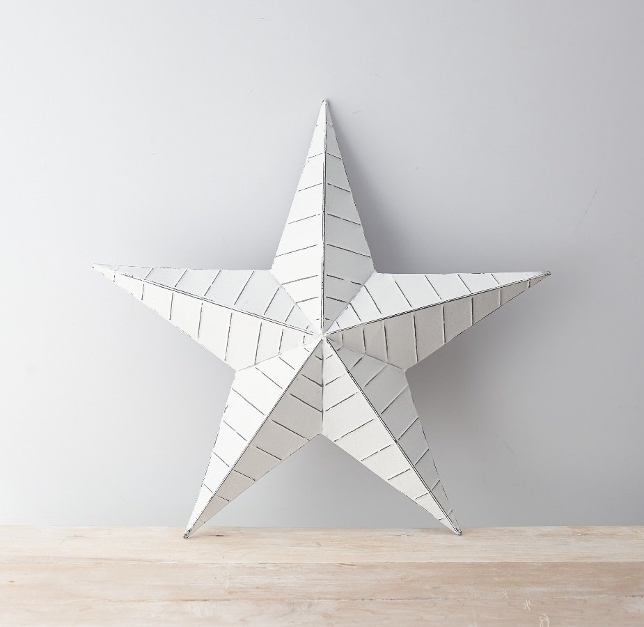 Make a statement with this vintage inspired white metal barn star with distressed ridges. 