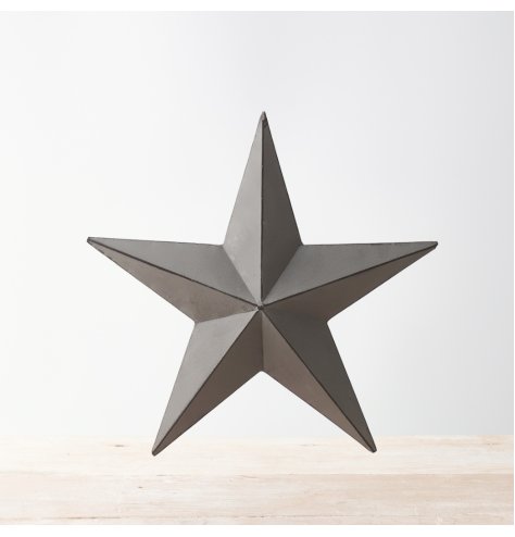 A vintage inspired grey metal barn star with distressed detailing. Hang on walls or display on shelves for a chic look