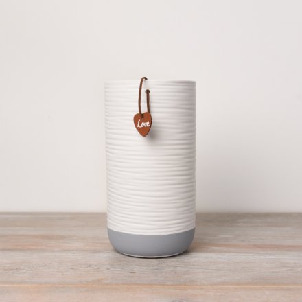 A contemporary colour block vase in classic white and grey colours.