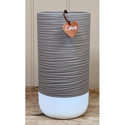 A chic and stylish two tone ceramic pot with added ridged decals and a heart shaped faux leather tag 