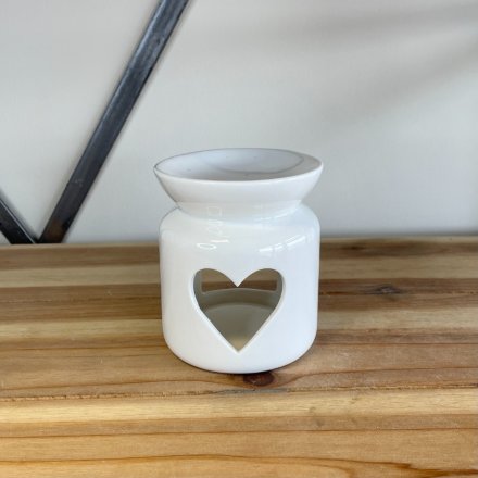 Fall in love with this simple and chic oil burner with a heart shaped cut out design.